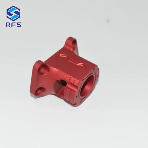 Red anodized CNC milled 6061-T6 aluminum motorcycle base flange, front view
