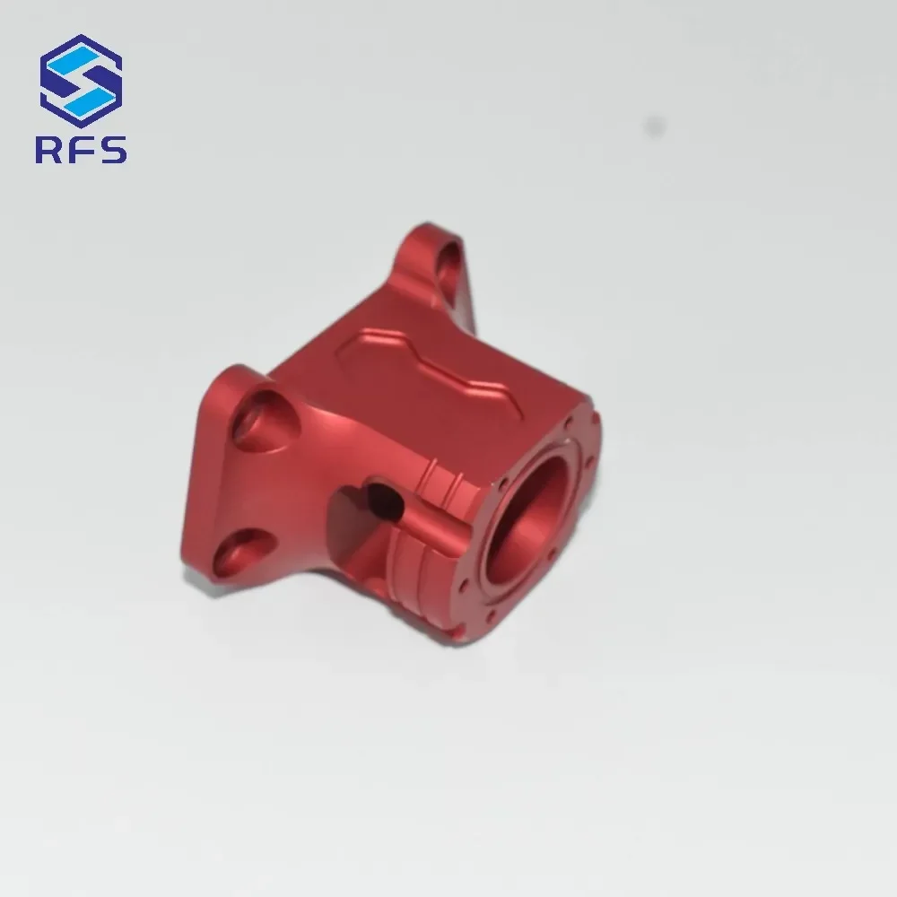 Red anodized CNC milled 6061-T6 aluminum motorcycle base flange, front view
