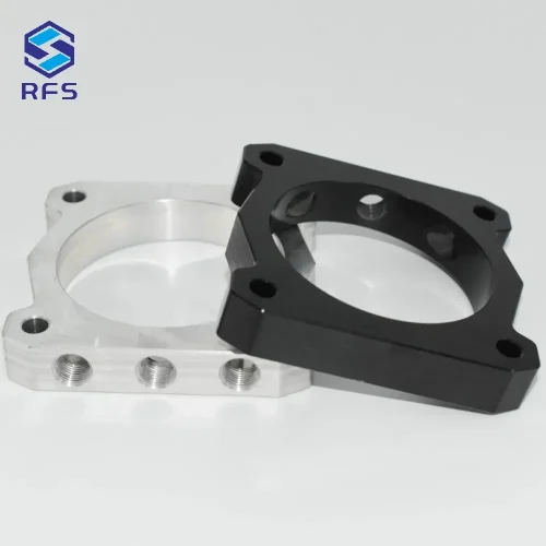 Custom CNC milled steel spacers in black and silver surface finishes