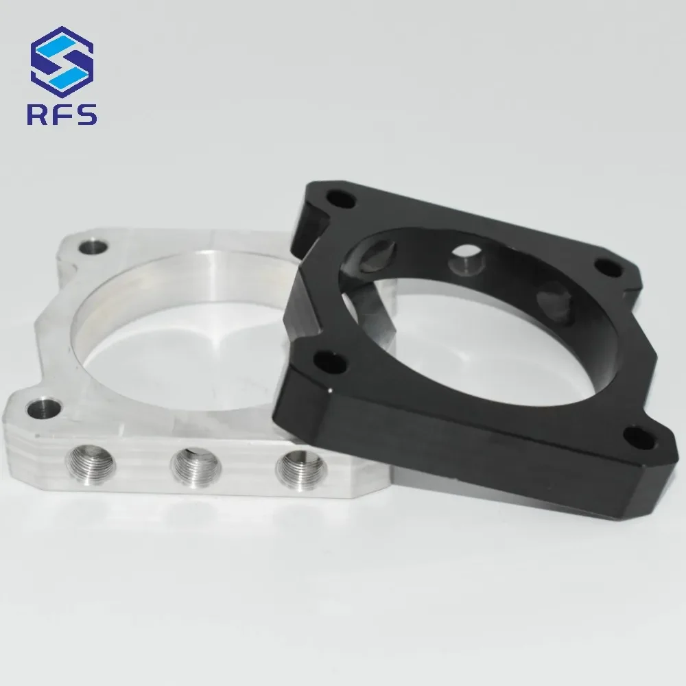 Custom CNC milled steel spacers in black and silver surface finishes