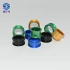 Assorted colorful anodized aluminum bushings and sleeves