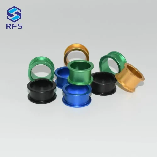 Assorted colorful anodized aluminum bushings and sleeves